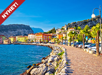 Den fargerike byen Torbole, Gardasjøen i Italia